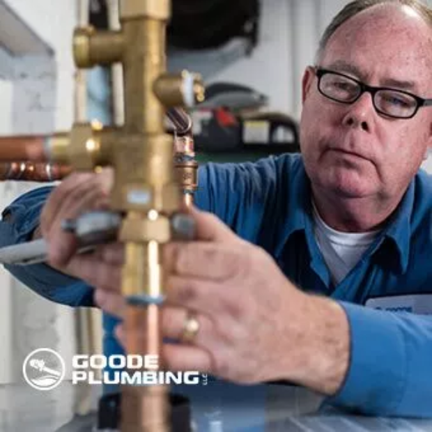 plumber repairing pipes